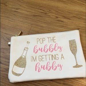 Makeup bag pop the bubbly I’m getting a hubby